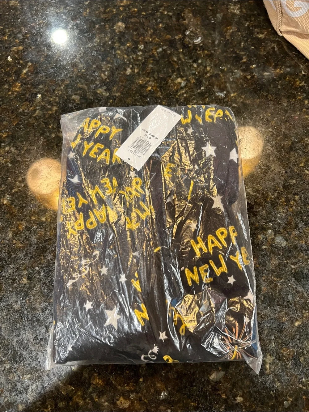 Old Navy Black Footed One-Piece with Gold and White New Year Print size 0-3
